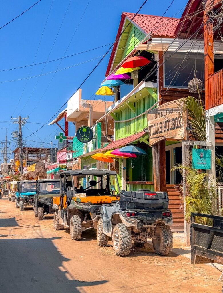 street in holbox with taxis
